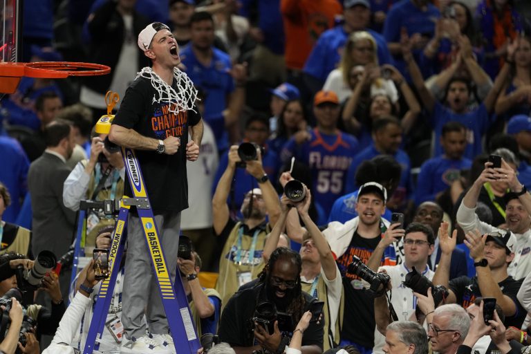Todd Golden reacts after cutting the net in the national championship game of the Final Four of the 2025 NCAA Tournament at the Alamodome.
