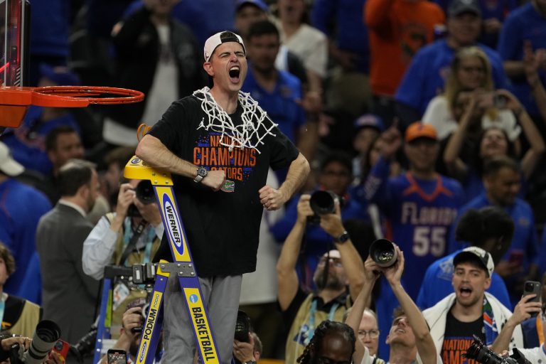 Florida Gators head coach Todd Golden reacts after cutting the net in the national championship game of the Final Four of the 2025 NCAA Tournament at the Alamodome.