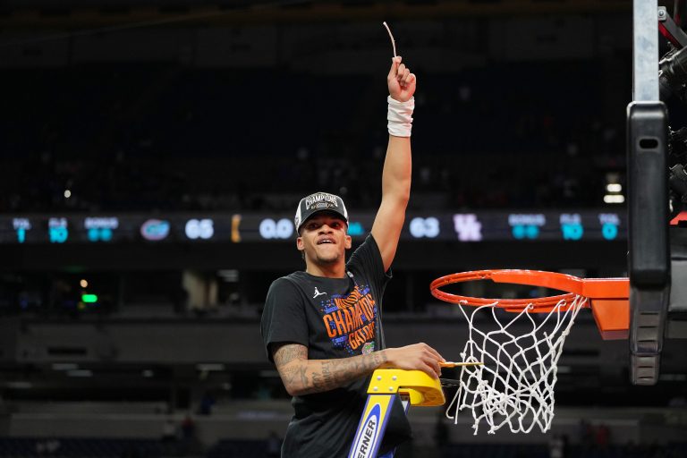 Florida Gators guard Will Richard (5) reacts after cutting down a piece of the net after winning the national championship game of the Final Four of the 2025 NCAA Tournament at the Alamodome.