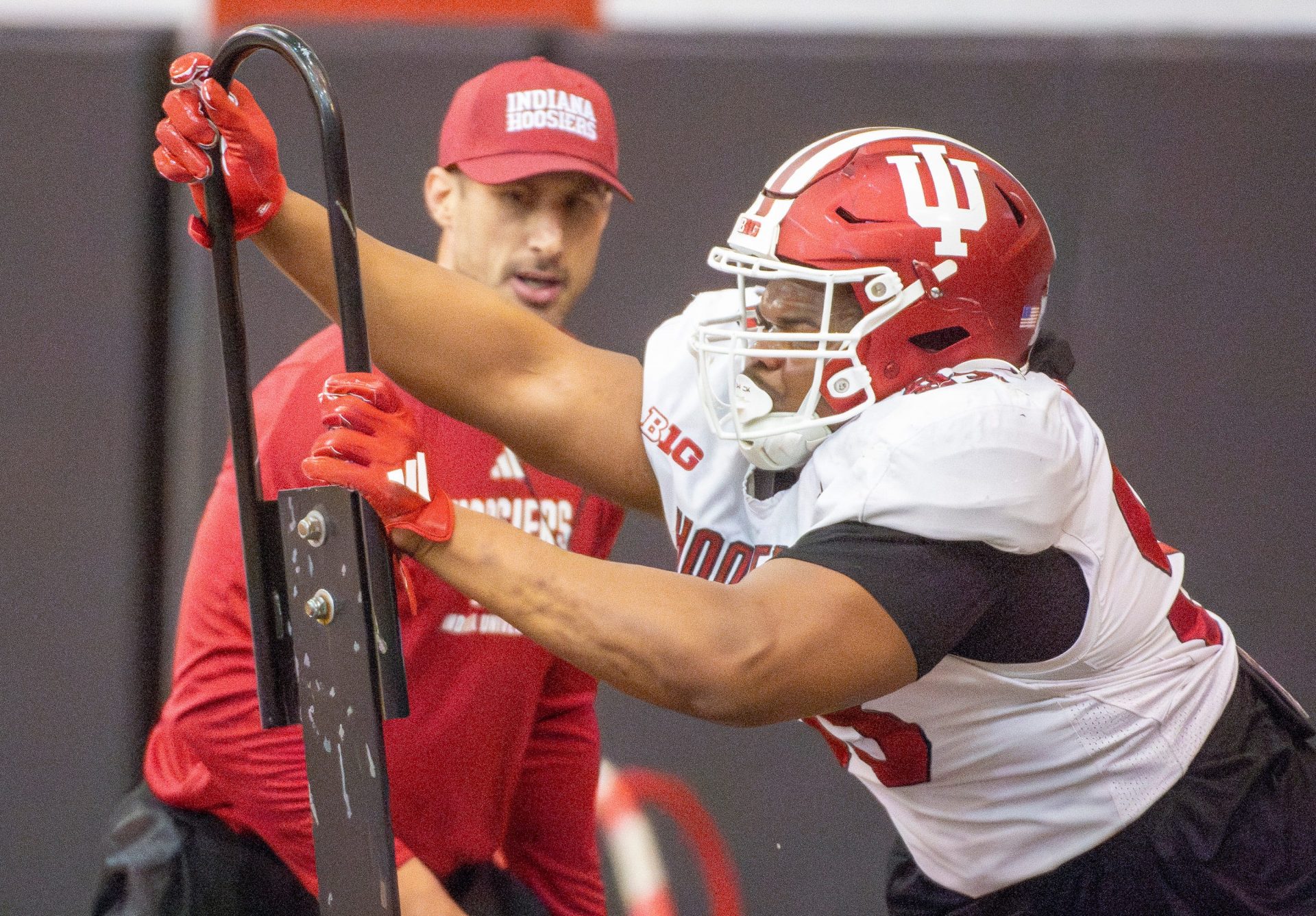 Indiana's Robby Harrison (93) runs a drill during spring football practice on Tuesday, April 8, 2025.