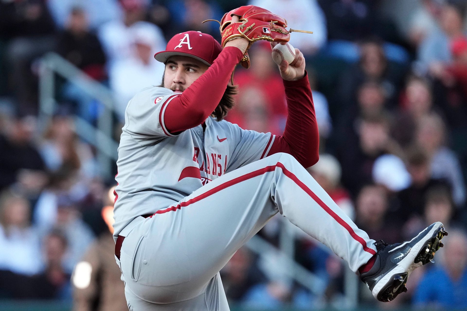 Arkansas pitcher Zach Root (33) looks to throw during a NCAA baseball game against Georgia in Athens, Ga., on Friday, April 11, 2025.