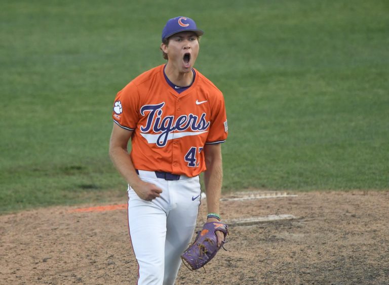 Clemson senior Lucas Mahlstedt (47) reacts after closing out the game against University of Louisville at Doug Kingsmore Stadum in Clemson, S.C. Friday, April 18, 2025. Clemson won 2-1, taking the ACC series.