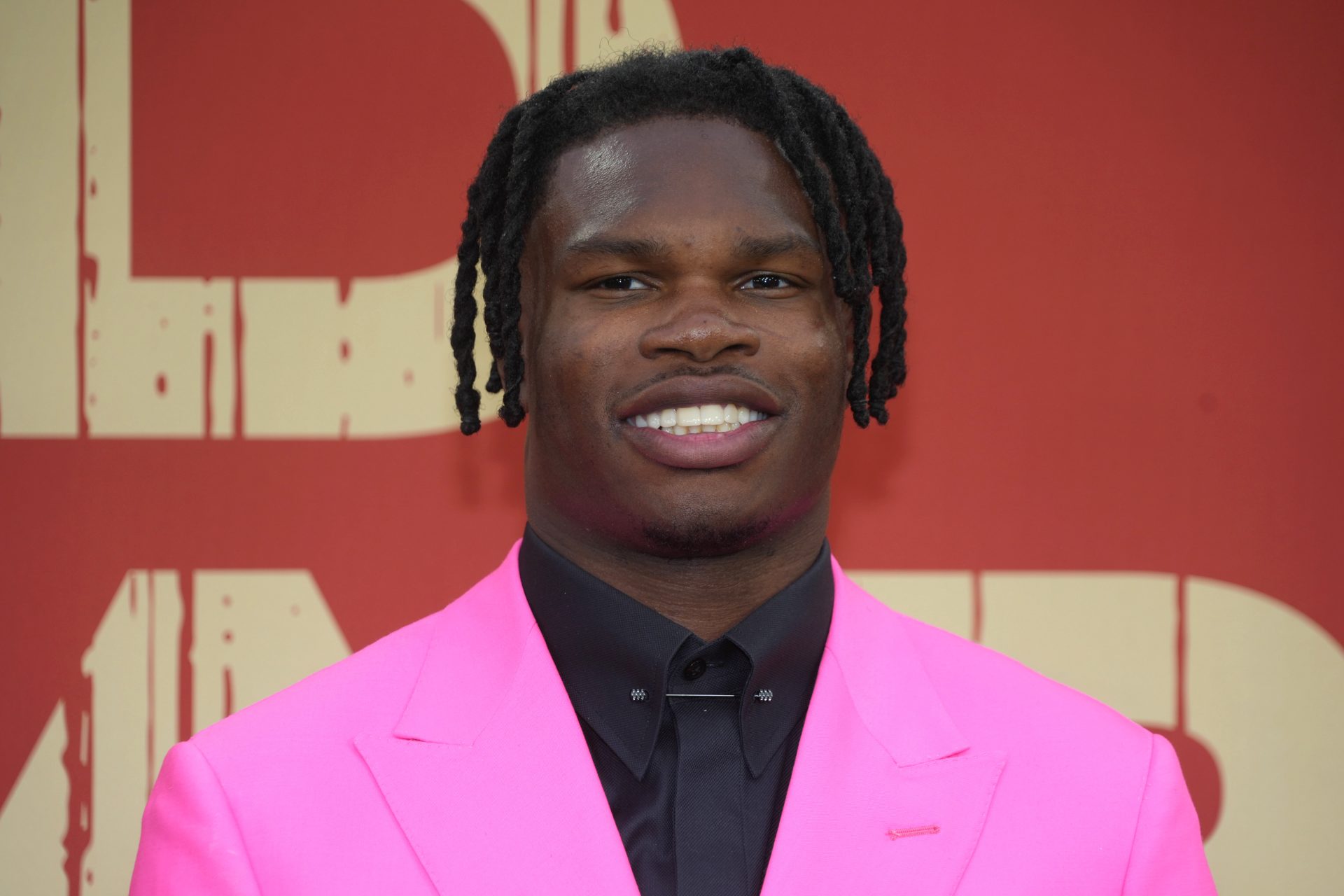 Colorado Buffaloes wide receiver Travis Hunter on the red carpet before the 2025 NFL Draft at Lambeau Field.