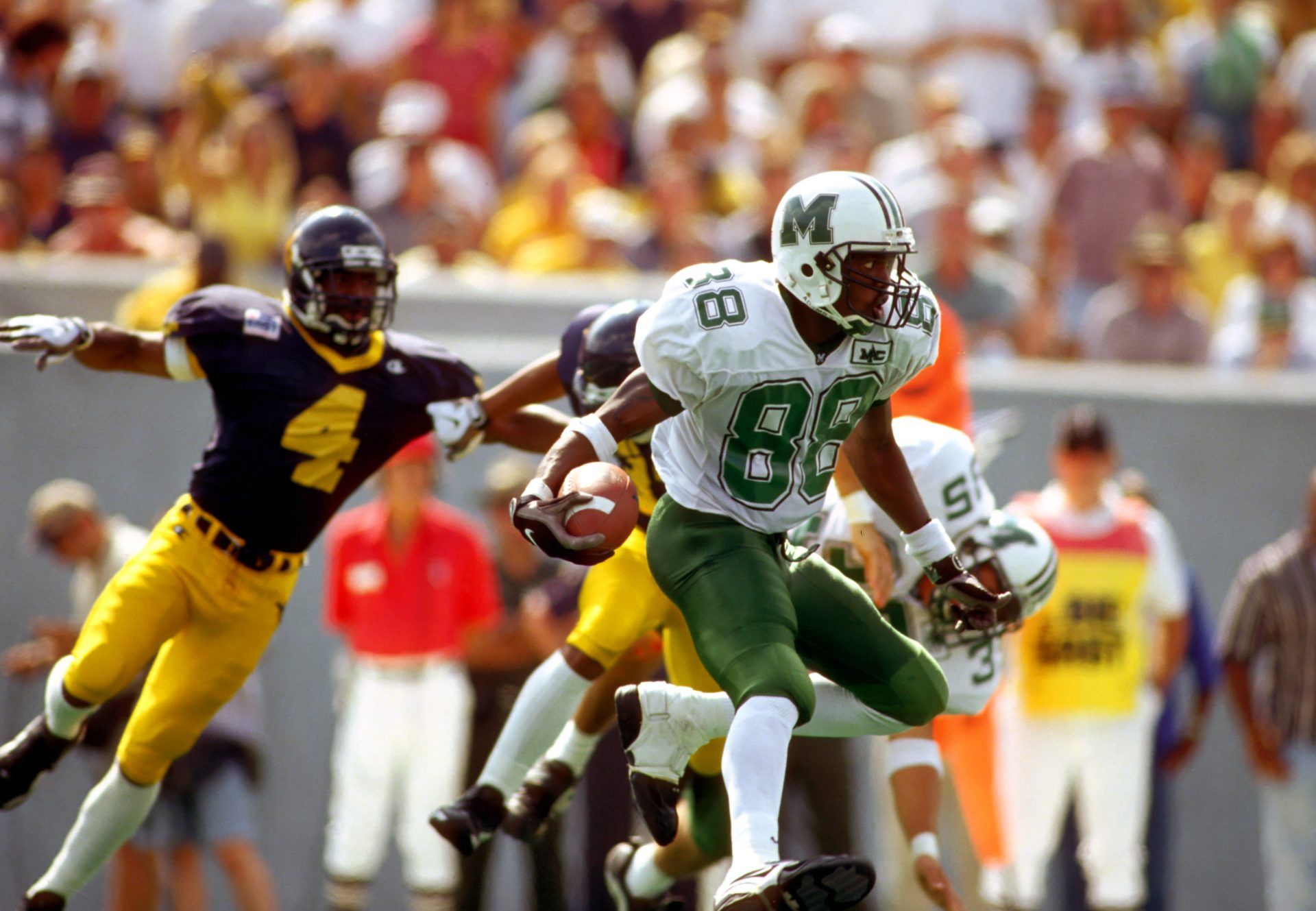 FILE PHOTO; Marshall Thundering Herd receiver Randy Moss (88) in action against the West Virginia Mountaineers at Milan Puskar Stadium.