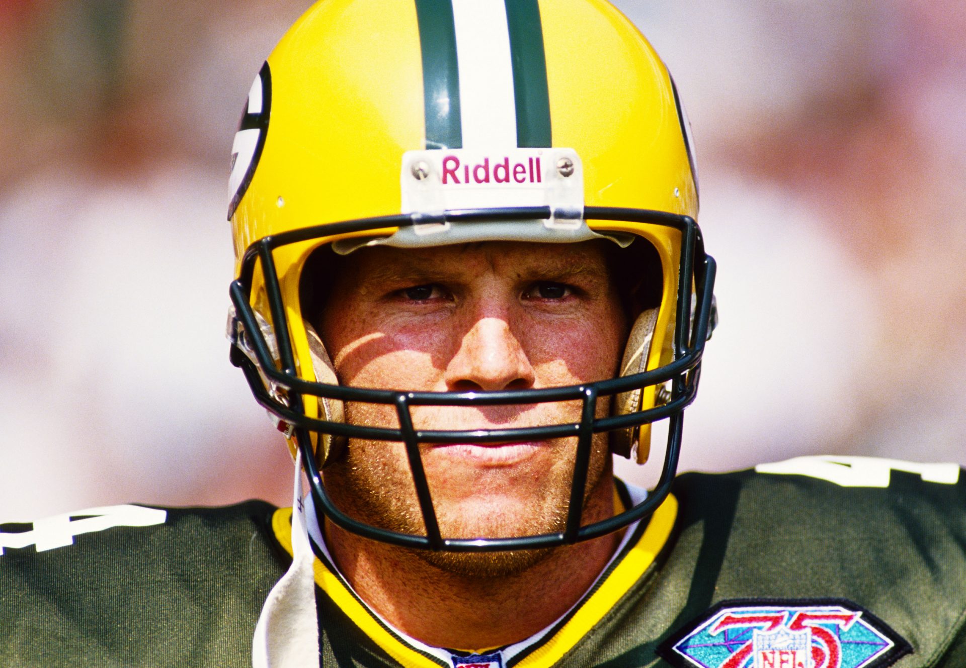 Green Bay Packers quarterback Brett Favre (4) on the sidelines against the Miami Dolphins at Lambeau Field.