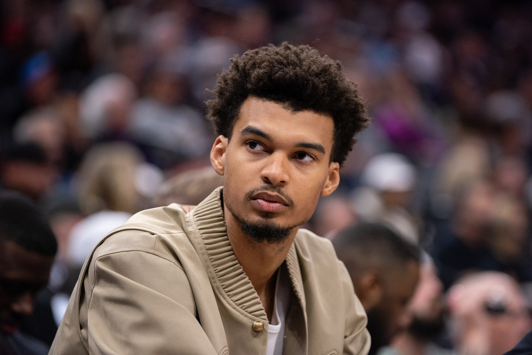 San Antonio Spurs center Victor Wembanyama (1) looks on from the bench during the fourth quarter of the game against the Sacramento Kings at Golden 1 Center.