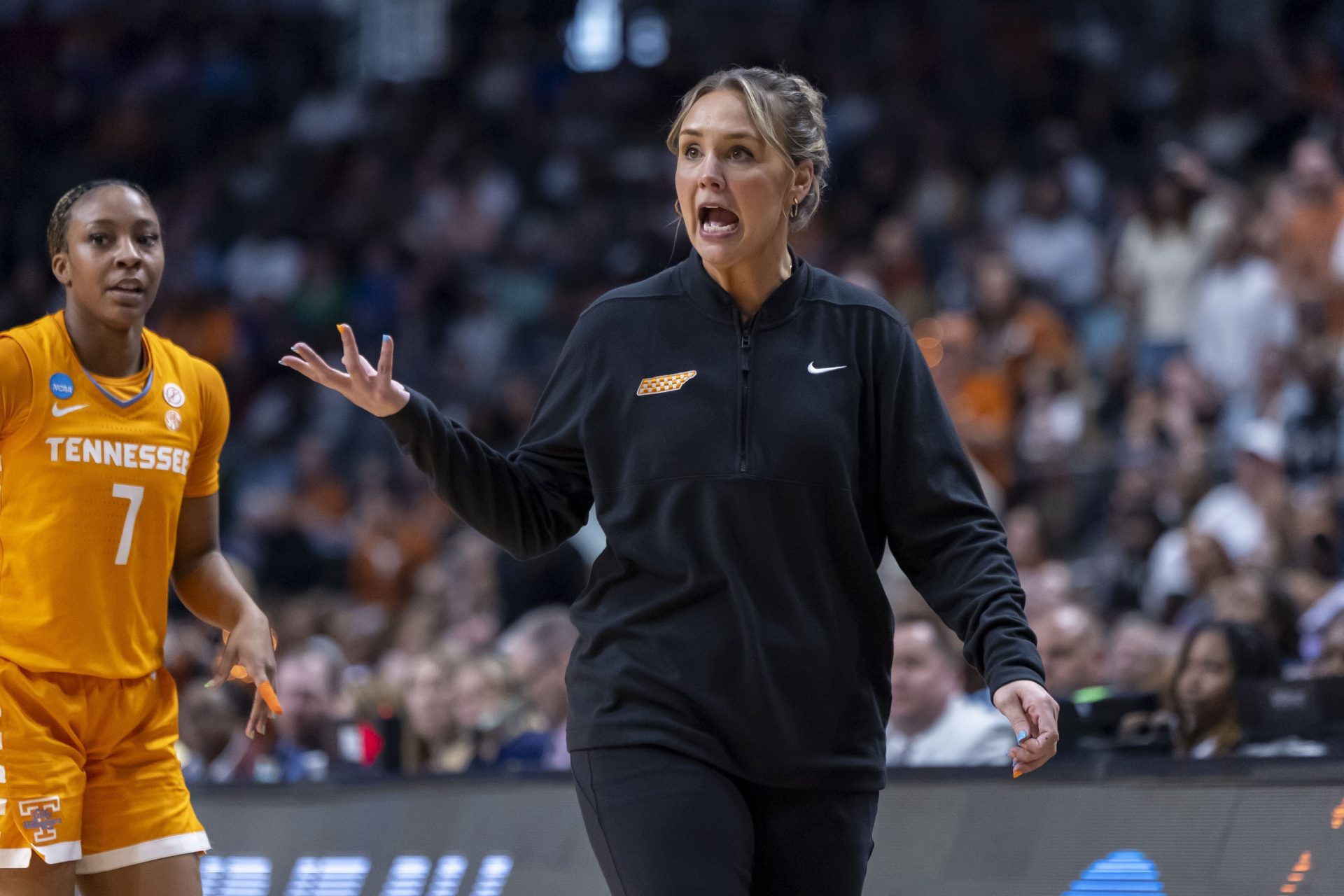 Tennessee Lady Vols head coach Kim Caldwell reacts to a call during the second half of a Sweet 16 NCAA Tournament basketball game against the Texas Longhorns at Legacy Arena.