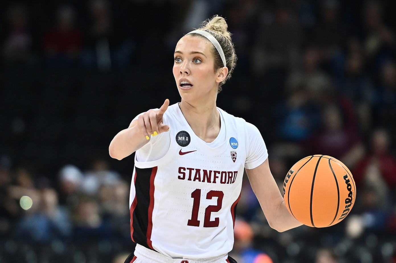 Stanford Cardinal guard Lexie Hull (12) brings the ball down court against the Maryland Terrapins in the Spokane regional semifinals of the women's college basketball NCAA Tournament at Spokane Veterans Memorial Arena.