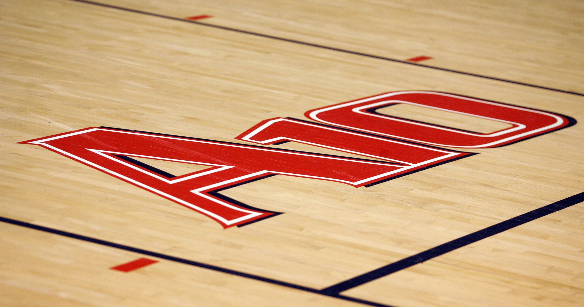 A general view of the Atlantic 10 logo before the game between the Temple Owls and the Richmond Spiders at the Robins Center.