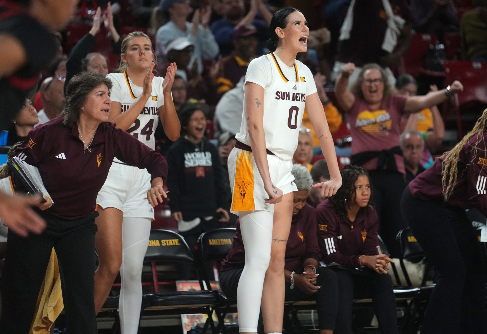 ASU Sun Devils forward Kennedy Basham (0). celebrates her teammates from the bench during their game against the Jacksonville State Gamecocks