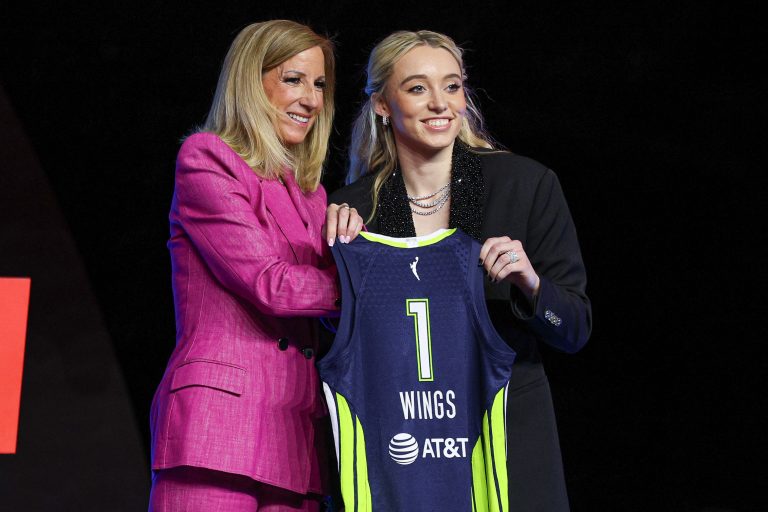Paige Bueckers poses with WNBA commissioner Cathy Engelbert after being selected with the number one overall pick to the Dallas Wings in the 2025 WNBA Draft at The Shed at Hudson Yards.
