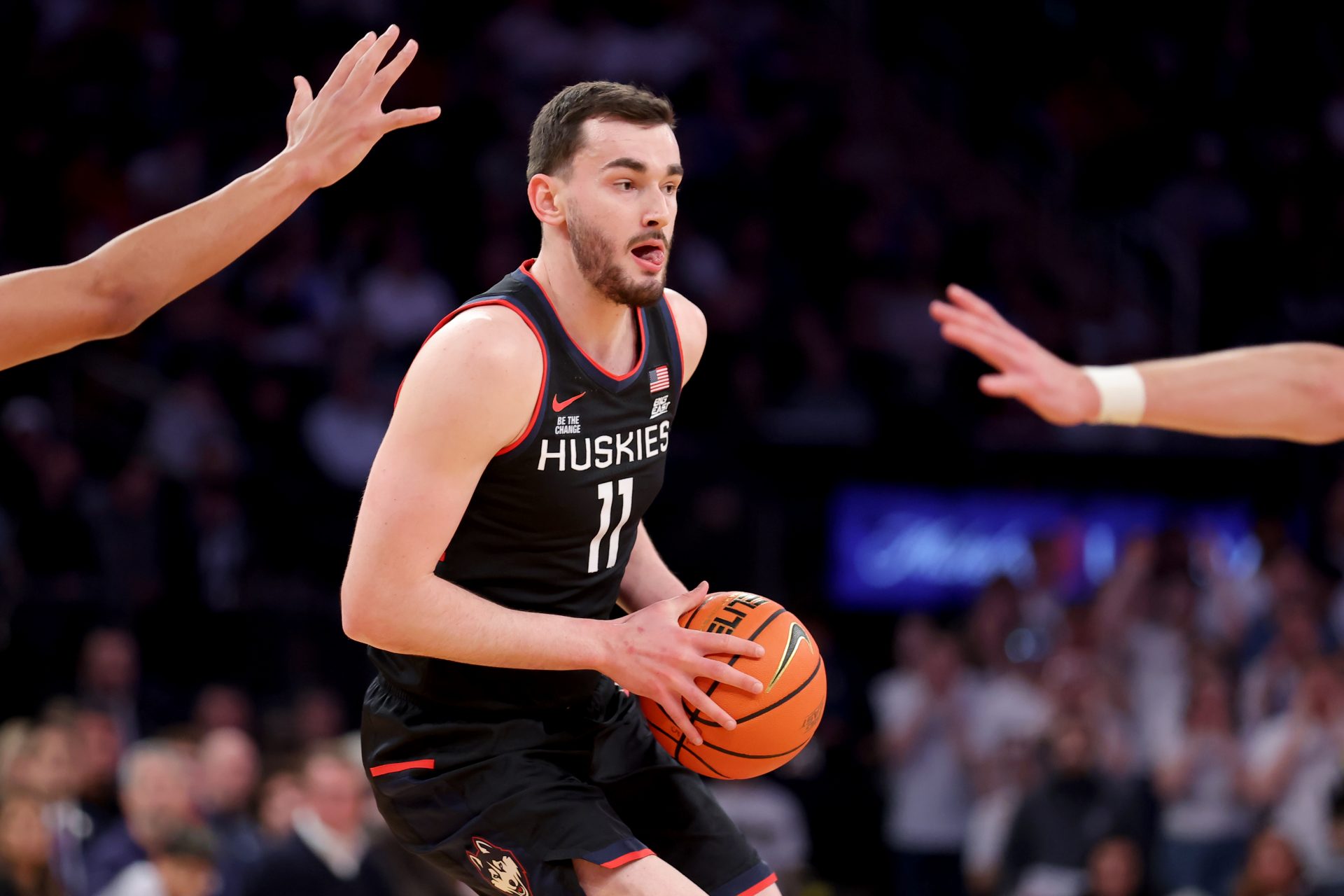 Connecticut Huskies forward Alex Karaban (11) controls the ball against the Creighton Bluejays during the first half at Madison Square Garden.