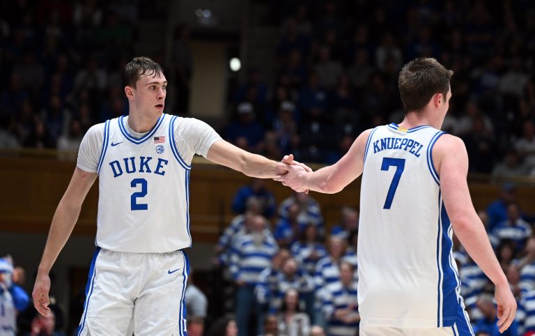 Duke Blue Devils forward Cooper Flagg (2) and forward Kon Knueppel (7) react during the second half against the George Mason Patriots at Cameron Indoor Stadium.