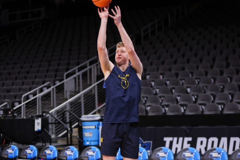 Michigan Wolverines center Danny Wolf (1) shoots during NCAA Tournament South Regional Practice at State Farm Arena.