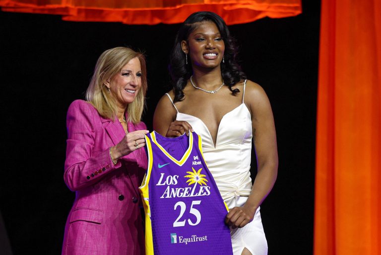 Sania Feagin poses with WNBA commissioner Cathy Engelbert after being selected with the number twenty one overall pick to the Los Angeles Sparks in the 2025 WNBA Draft at The Shed at Hudson Yards.