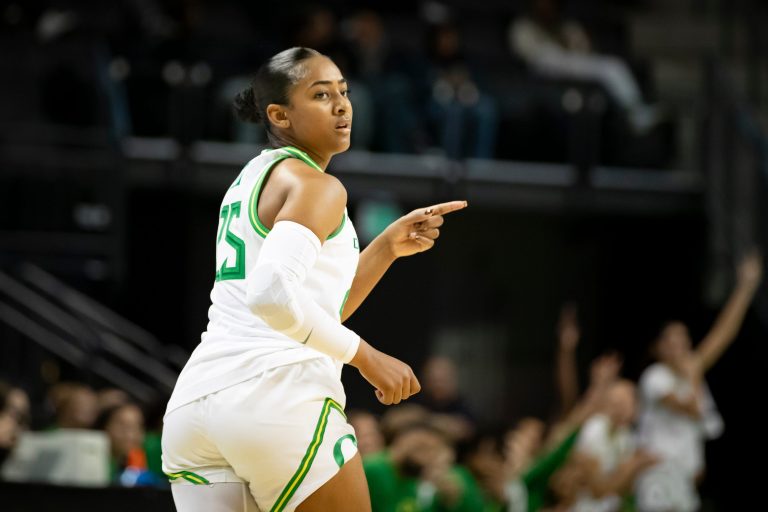 Oregon guard Deja Kelly celebrates a shot as the Oregon Ducks host the Warner Pacific Knights in an exhibition game