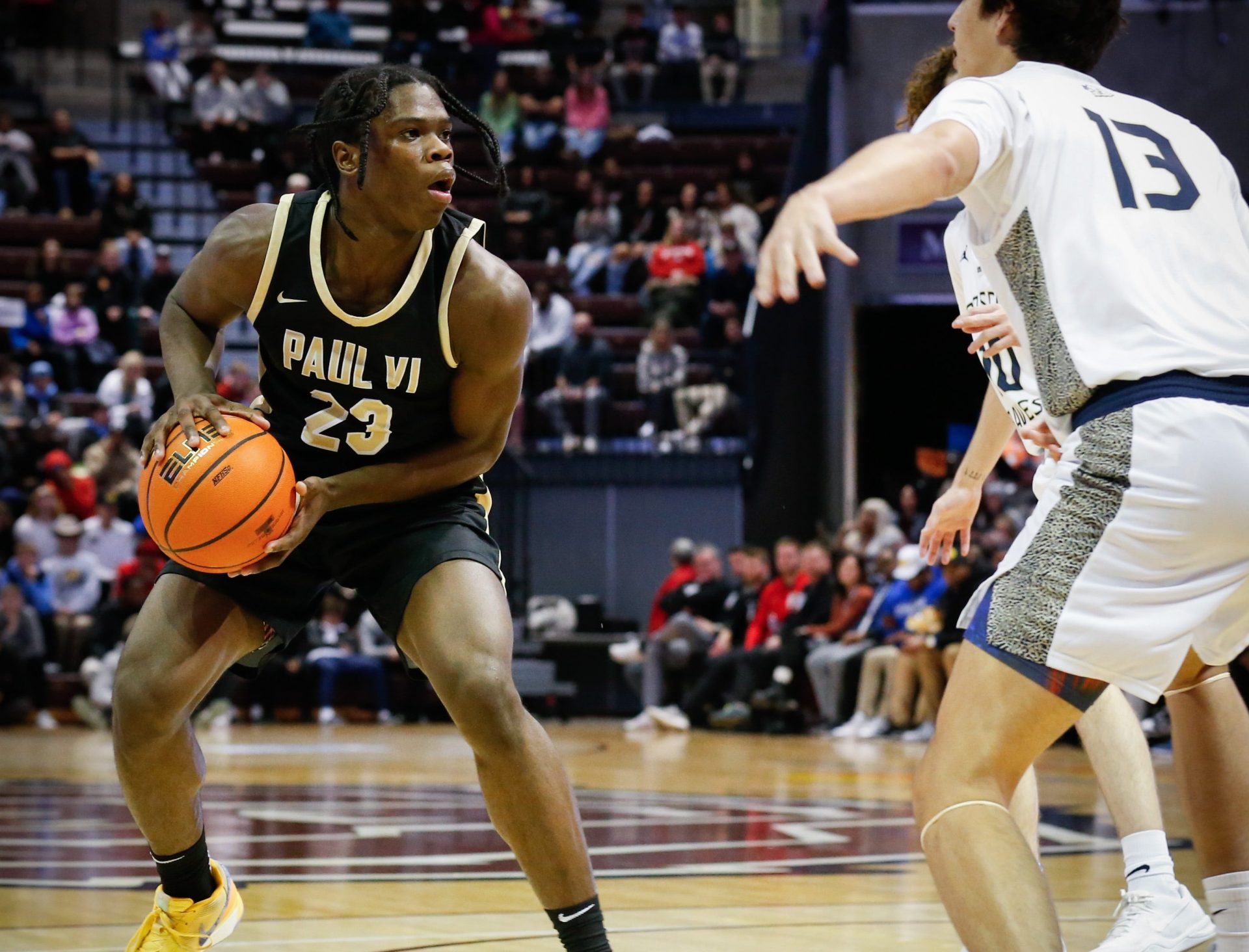 Sophomore Guard Jordan Smith Jr. of Paul VI Catholic (Virginia) holds onto the ball during the championship game of the Tournament of Champions against St. John Bosco