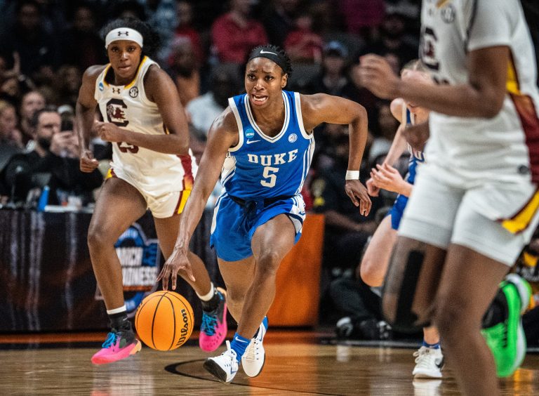 Duke Blue Devils guard Oluchi Okananwa (5) brings the ball down during the second half of the NCAA Regional Final game