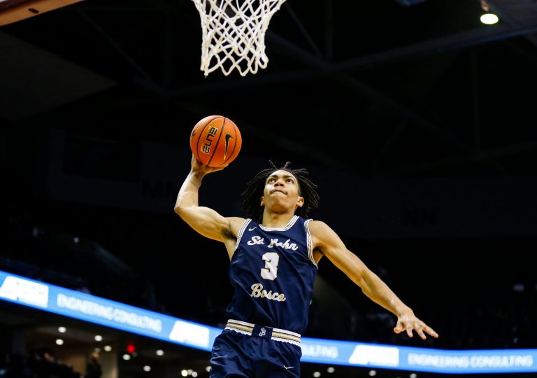 St. John Bosco's (Calif.) Elzie Harrington dunks the ball as the Braves take on the Central Bulldogs during the 39th Annual Bass Pro Shops Tournament of Champions