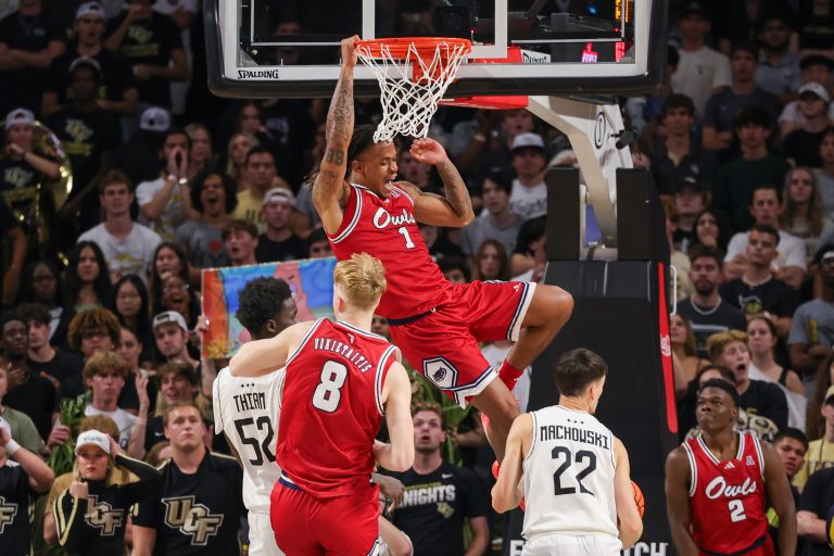Florida Atlantic Owls forward Kaleb Glenn (1) dunks during the second half against the UCF Knights at Addition Financial Arena.