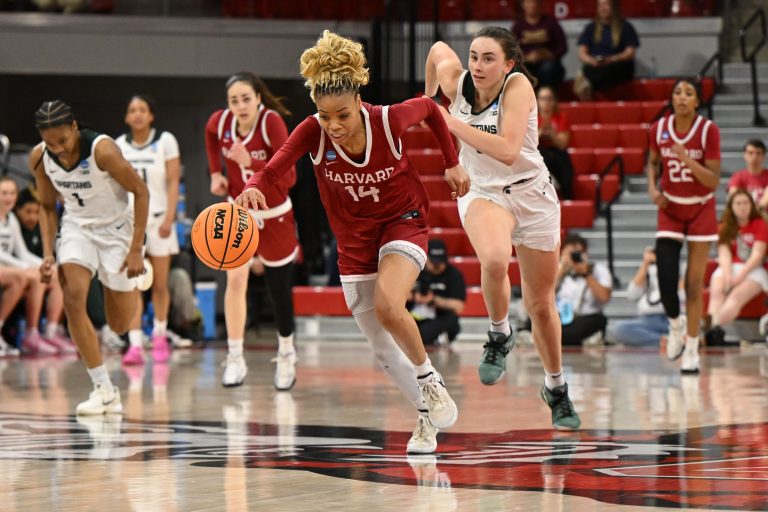 Harvard Crimson guard Harmoni Turner (14) races down court during the second half at James T. Valvano Arena at William Neal Reynolds.