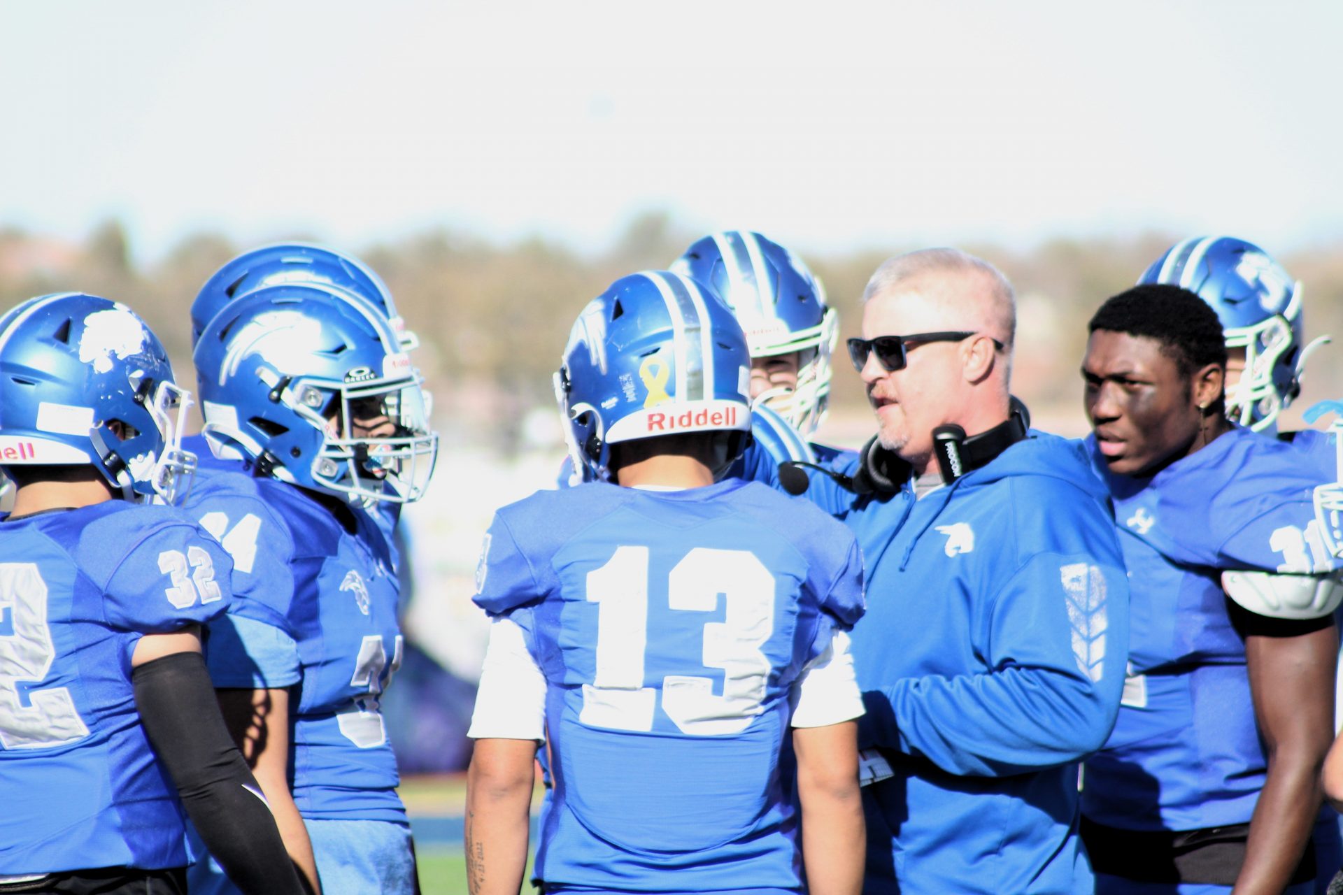 Pueblo Central's head coach Kris Cotterman speaks to his team prior to kickoff against Lutheran during the CHSAA Class 3A first round football playoffs held at Dutch Clark Stadium on Nov. 16, 2024.
