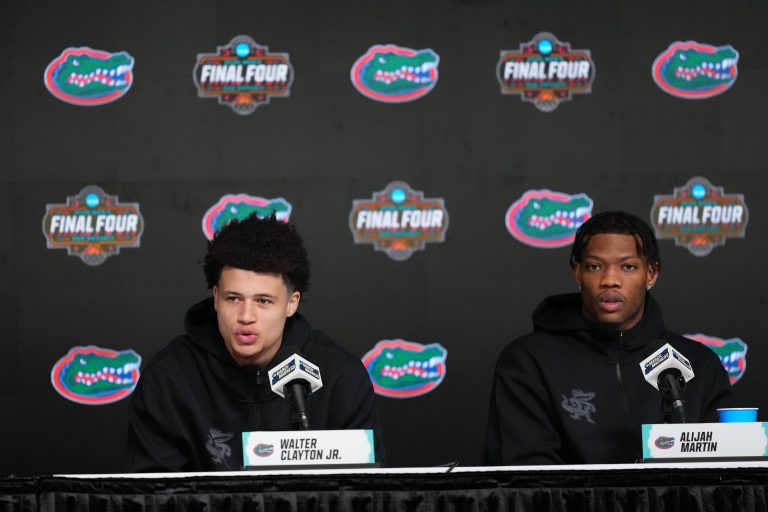 Florida Gators guards Walter Clayton Jr. (1) and Alijah Martin (15) speak to the media during a press conference for the men's 2025 NCAA tournament at Alamodome.