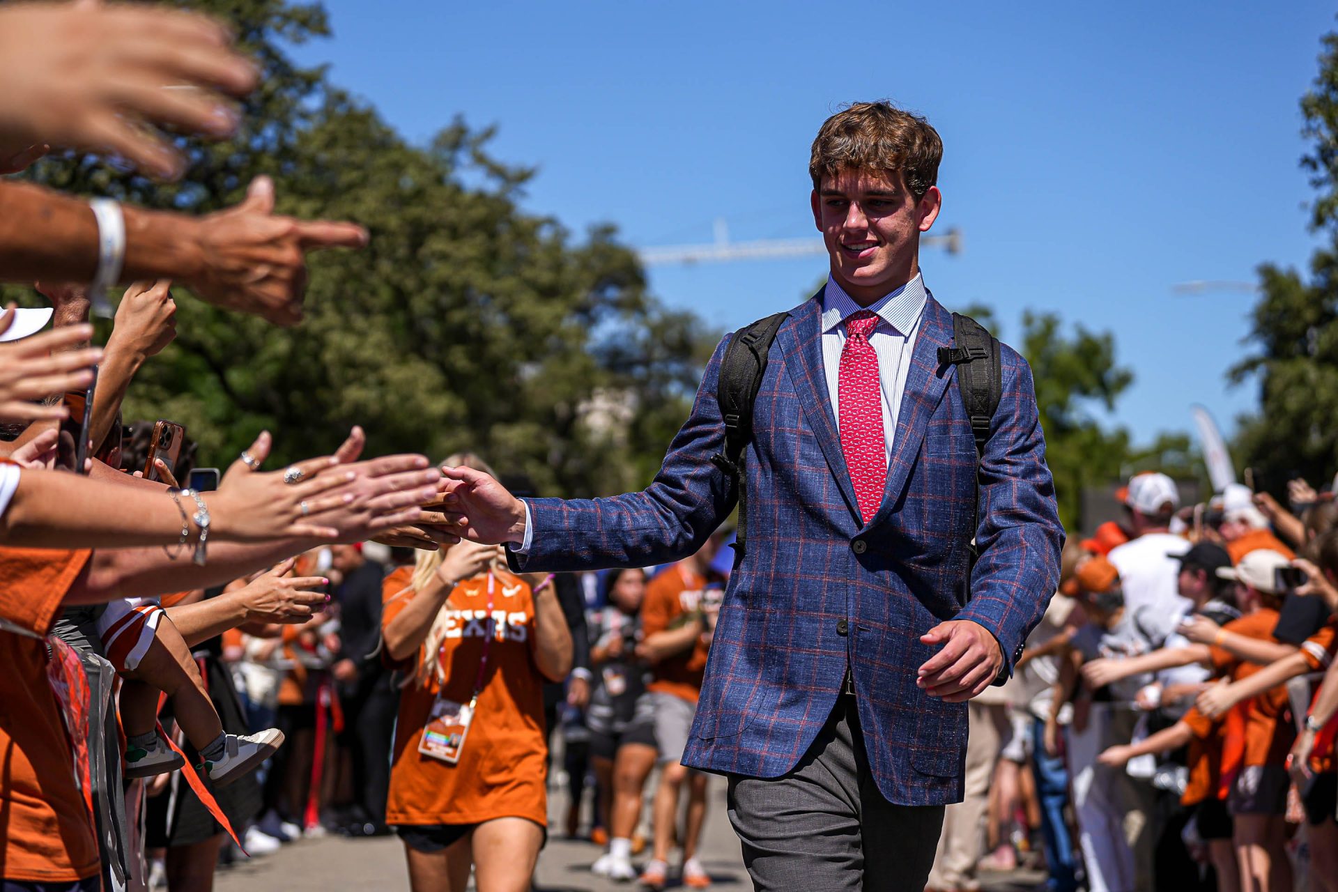 Texas Longhorns quarterback Arch Manning greets fans ahead of the game against Mississippi State at Darrell K Royal-Texas Memorial Stadium in Austin Saturday, Sept. 28, 2024.