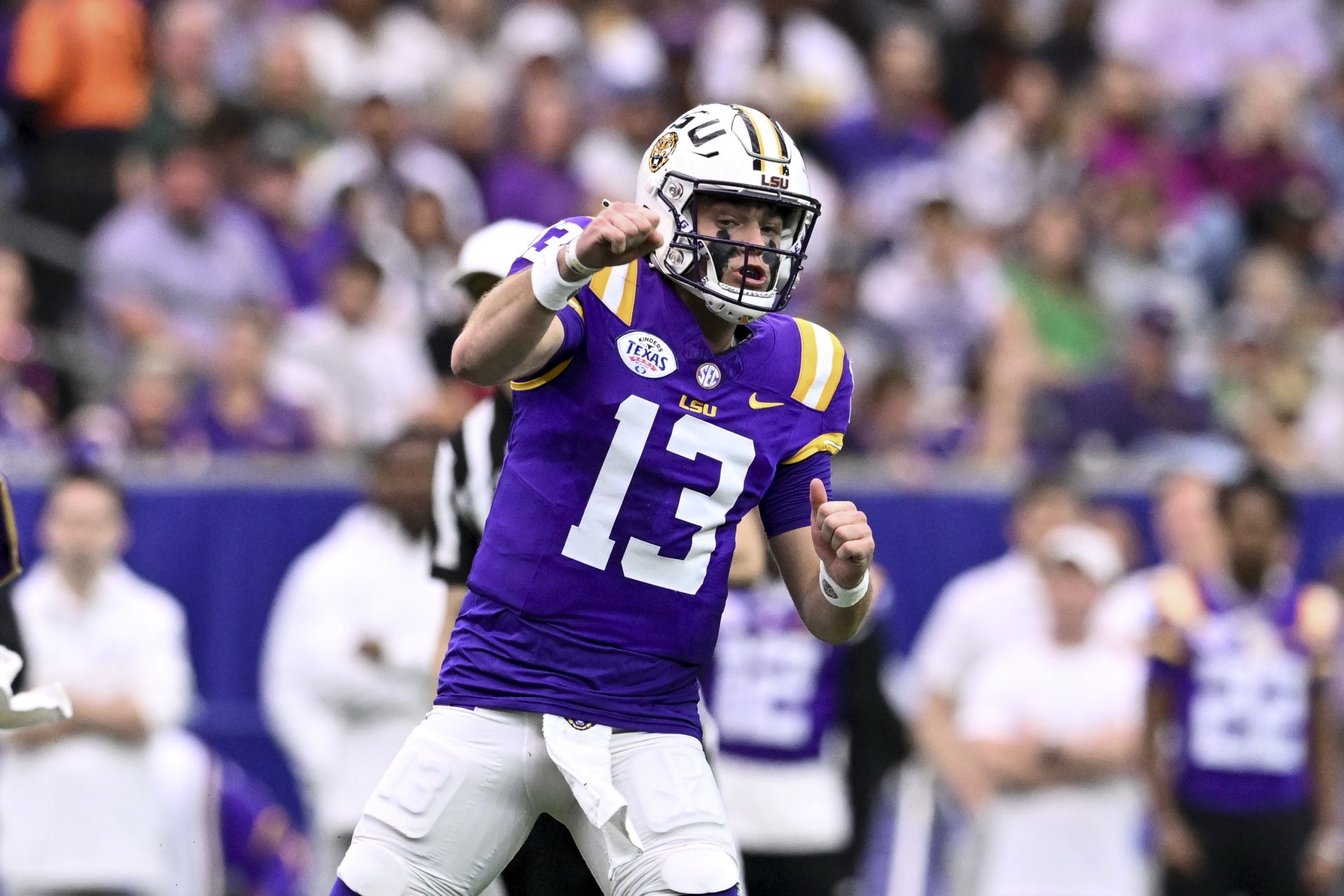 LSU Tigers quarterback Garrett Nussmeier (13) reacts during the first quarter against the Baylor Bears at NRG Stadium.