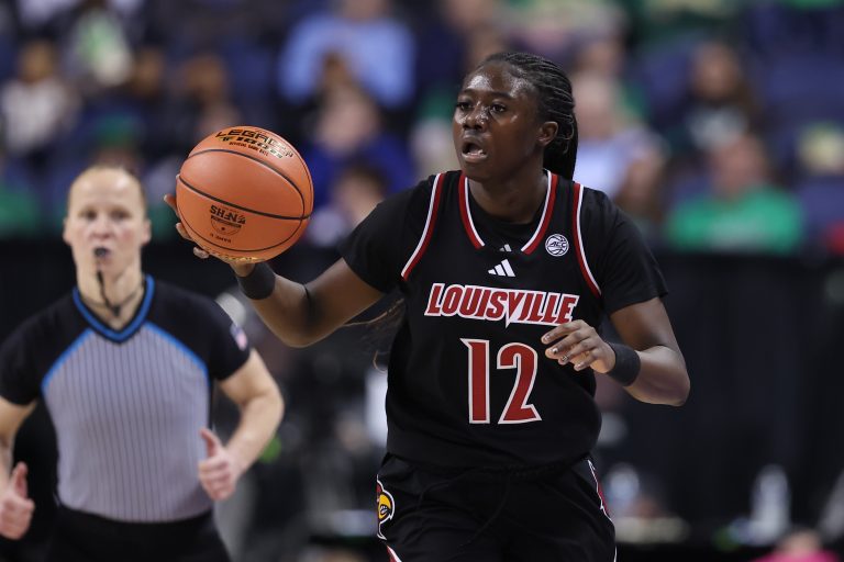 Louisville Cardinals guard Ja'Leah Williams (12) brings the ball up court against Duke Blue Devils during the first quarter at First Horizon Coliseum.
