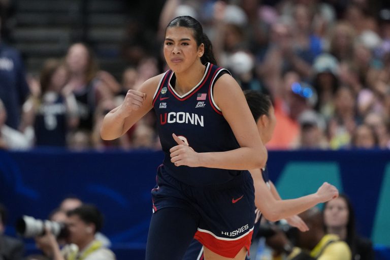 Connecticut Huskies center Jana El Alfy (8) reacts during the third quarter in a semifinal of the women's 2025 NCAA tournament against the UCLA Bruins at Amalie Arena.