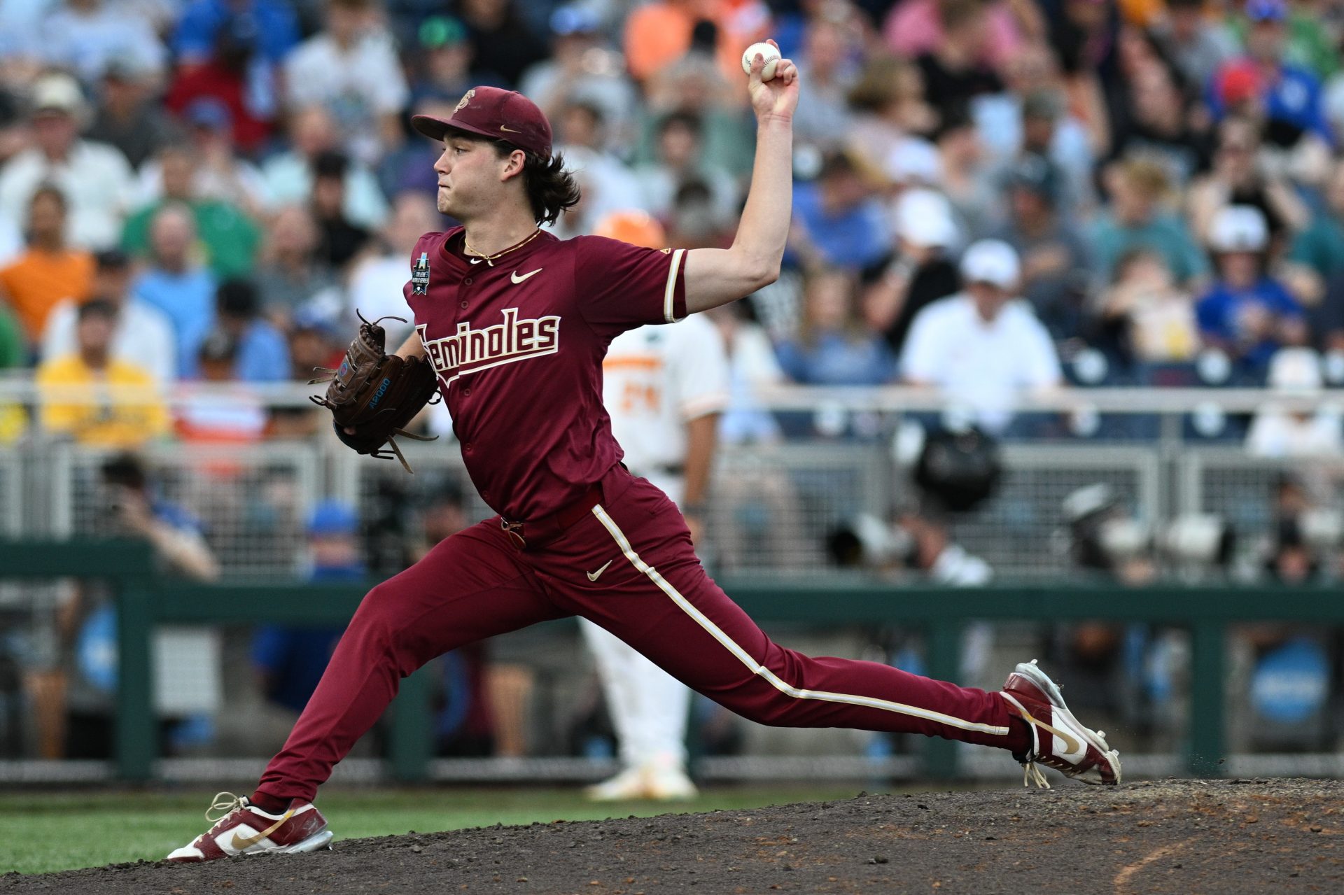 Florida State Seminoles starting pitcher Jamie Arnold (16) throws against the Tennessee Volunteers during the sixth inning at Charles Schwab Filed Omaha.