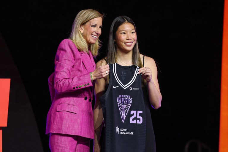 Kaitlyn Chen poses with WNBA commissioner Cathy Engelbert after being selected with the number thirty overall pick to the Golden State Valkyries in the 2025 WNBA Draft at The Shed at Hudson Yards