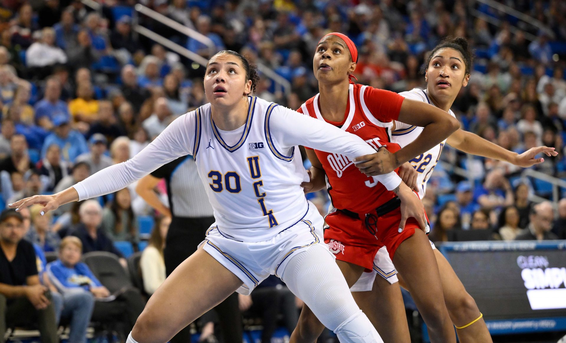 UCLA Bruins forward Timea Gardiner (30), Ohio State Buckeyes guard Kennedy Cambridge (3) and UCLA Bruins forward Kendall Dudley (22) during an NCAA basketball game at Pauley Pavilion presented by Wescom.