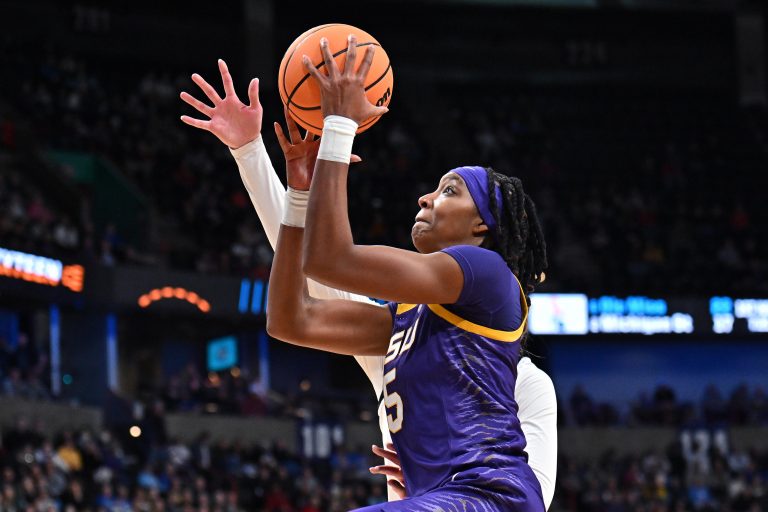 LSU Lady Tigers forward Sa'Myah Smith (5) shoots against NC State Wolfpack forward Tilda Trygger (18) during the first half of a Sweet 16 NCAA Tournament basketball game at Spokane Arena.