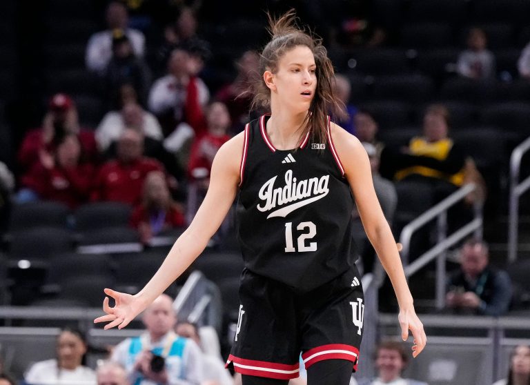 Indiana Hoosiers guard Yarden Garzon (12) celebrates scoring a three point basket
