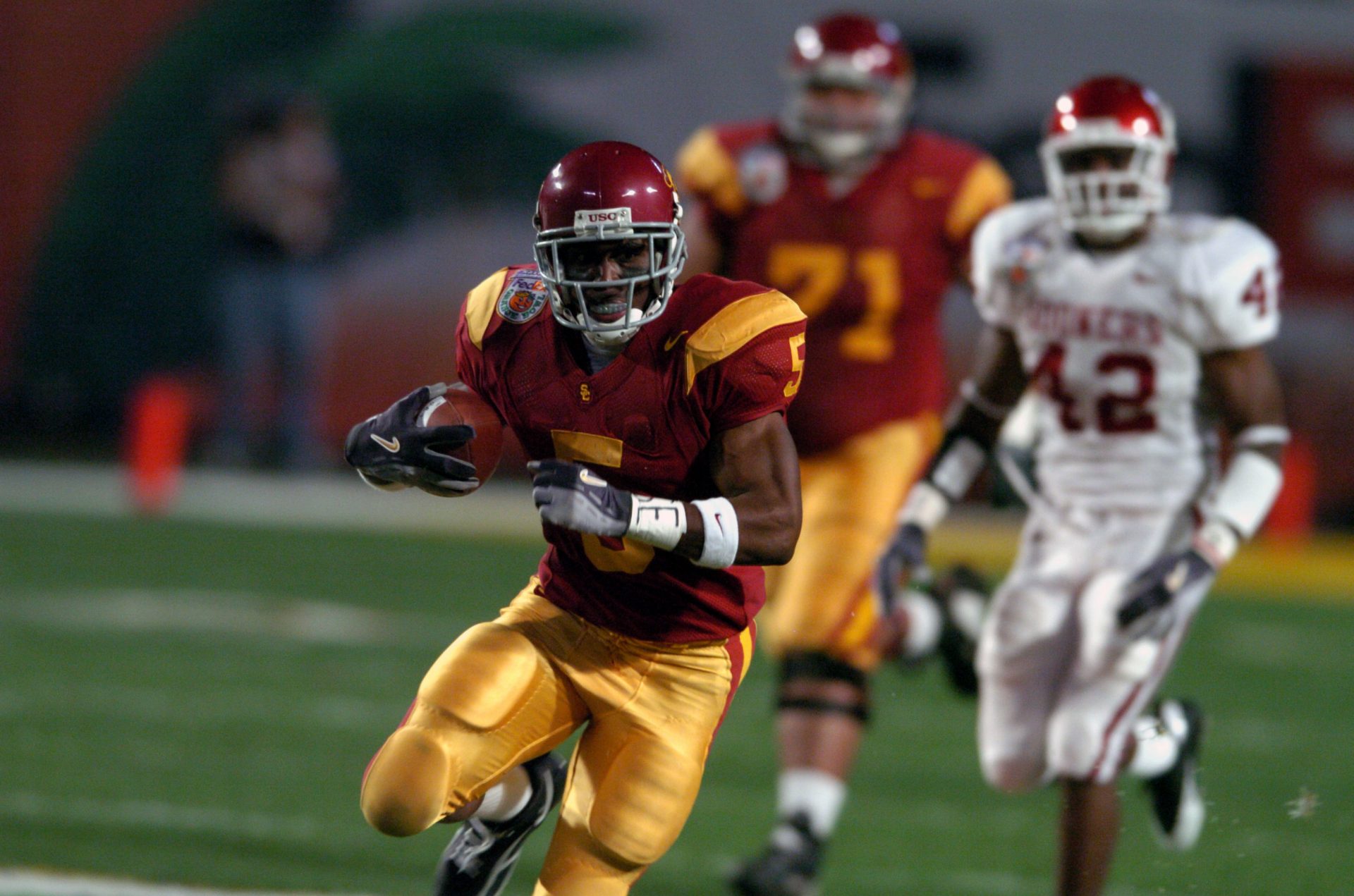 Southern California Trojans tailback Reggie Bush heads up field on the first play form scrimmage in a 55-19 victory over Oklahoma in the FedEx Orange Bowl during the BCS National Championship at Pro Player Stadium.
