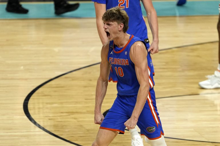 Florida Gators forward Thomas Haugh (10) reacts after a basket against the Auburn Tigers during the second half in the semifinals of the men's Final Four of the 2025 NCAA Tournament at Alamodome.