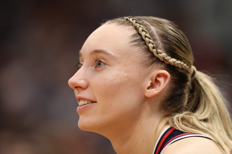 Connecticut Huskies guard Paige Bueckers (5) reacts on the bench during the fourth quarter in a semifinal of the women's 2025 NCAA tournament against the UCLA Bruins at Amalie Arena.