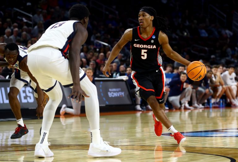 Georgia Bulldogs guard Silas Demary Jr. (5) dribbles against Gonzaga Bulldogs forward Graham Ike (13) in the second half of a first round men’s NCAA Tournament game at Intrust Bank Arena.
