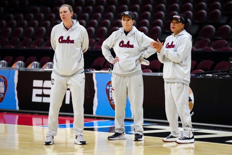 South Carolina Gamecocks assistant coach Mary Wooley (left), associate coach Lisa Boyer (center) and head coach Dawn Staley during practice at Rocket Mortgage FieldHouse.