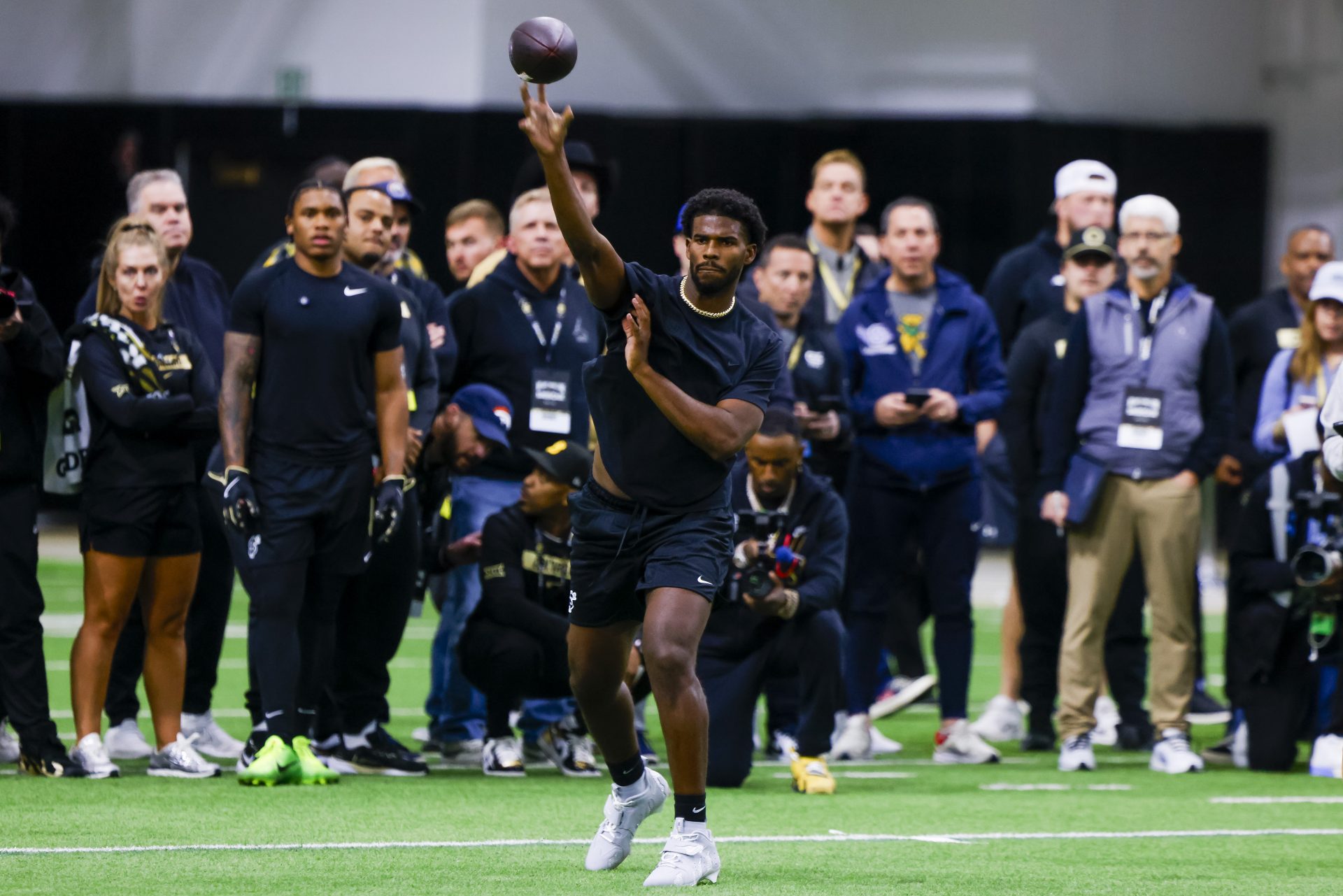 Colorado Buffaloes quarterback Shedeur Sanders (2) passes the ball at the University of Colorado NFL Showcase at the CU Indoor Practice Facility.