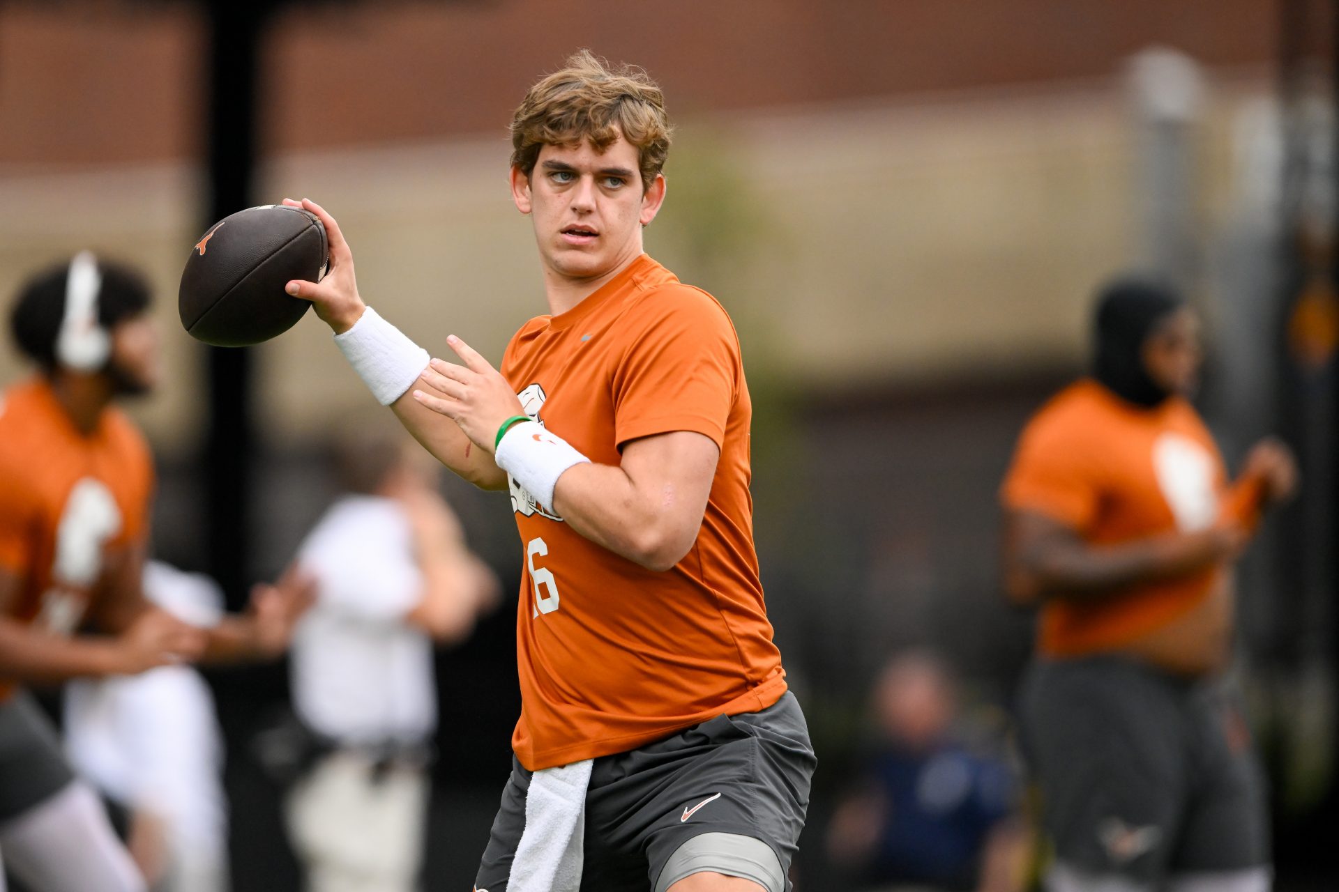 Texas Longhorns quarterback Arch Manning (16) throws against the Vanderbilt Commodores during pregame warmups at FirstBank Stadium.