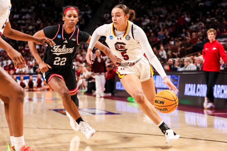 South Carolina Gamecocks guard Tessa Johnson (5) drives around Indiana Hoosiers guard Chloe Moore-McNeil (22) in the first half at Colonial Life Arena.