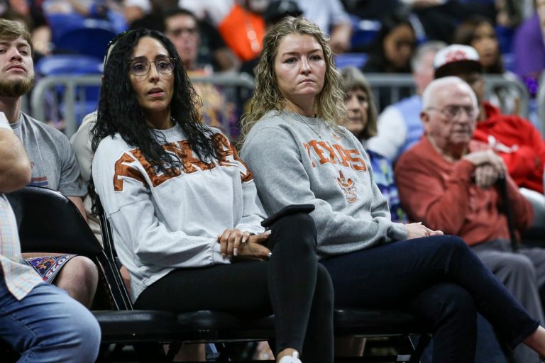University of Texas Associate Head Coach Elena Lovato, left, and Assistant Coach Blair Schaefer watch the Class 5A Division II state championship girls basketball game