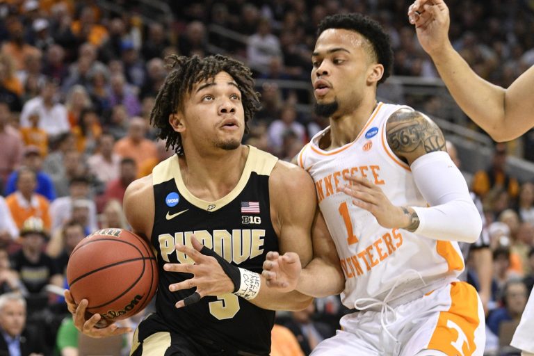 Purdue Boilermakers guard Carsen Edwards (3) drives to the basket as Tennessee Volunteers guard Lamonte Turner (1) defends during the first half in the semifinals of the south regional of the 2019 NCAA Tournament at KFC Yum Center.