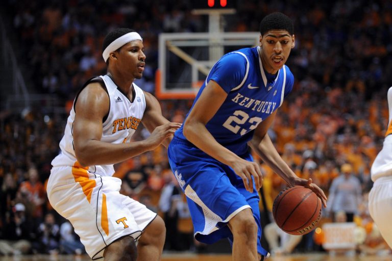 Kentucky Wildcats forward Anthony Davis (23) is defended by Tennessee Volunteers forward Jarnell Stokes (5) during the game at Thompson Boling Arena. Kentucky won 65-62.