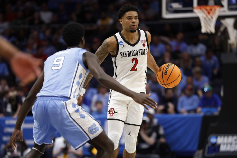 San Diego State Aztecs guard Nick Boyd (2) dribbles the ball defended by North Carolina Tar Heels guard Drake Powell (9) in the first half at UD Arena.