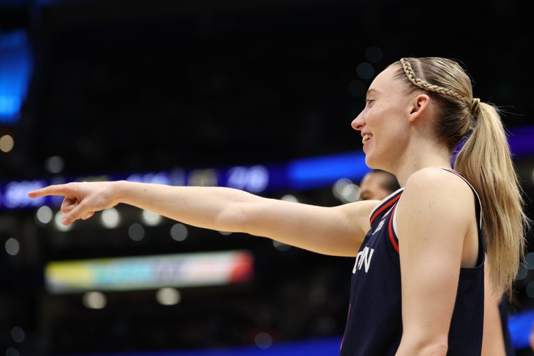 Connecticut Huskies guard Paige Bueckers (5) reacts on the bench during the fourth quarter in a semifinal of the women's 2025 NCAA tournament against the UCLA Bruins at Amalie Arena.