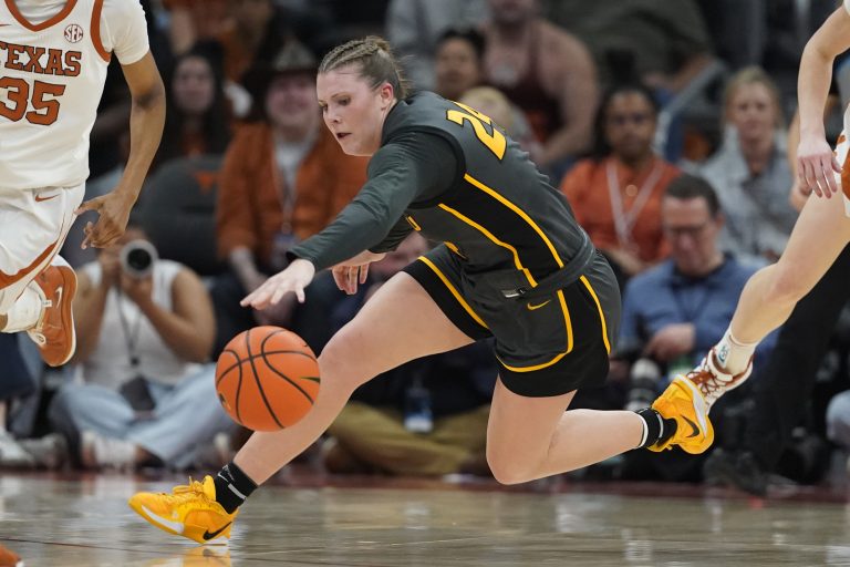 Missouri Tigers guard Ashton Judd (24) reaches for a loose ball during the second half against the Texas Longhorns at Moody Center.
